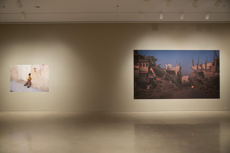 Two large photographs displayed side by side, highlighting themes of childhood and destruction in Lidwien van de Ven's work.