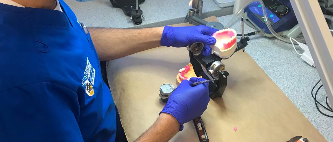 A dentist working.