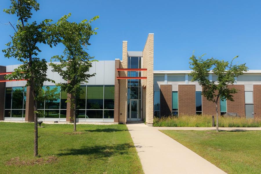 Exterior of 135 Innovation Drive on a sunny, summer day.