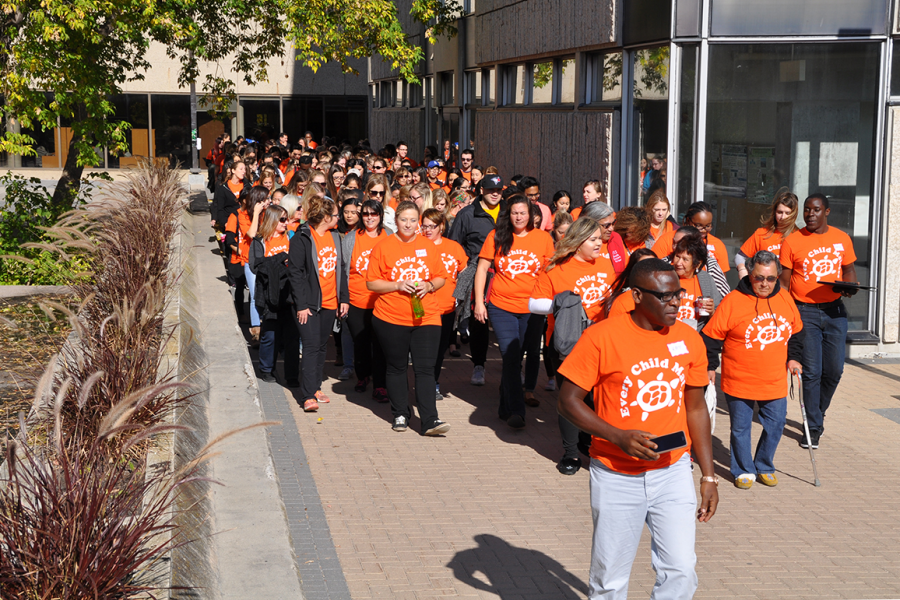 Students and staff walking for Orange Shirt Day